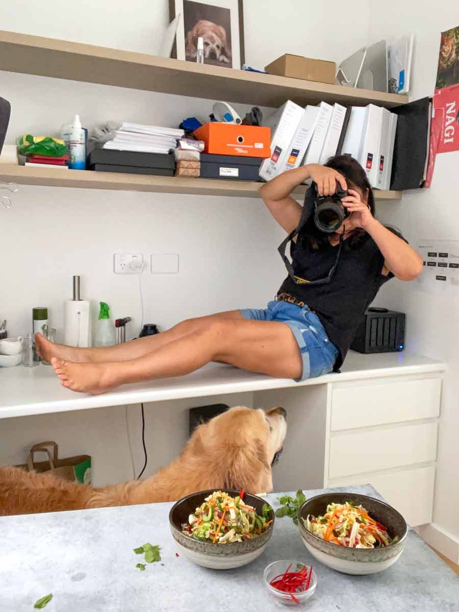nagi-taking-photos-desk