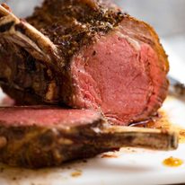 standing-rib-roast_prime-rib_0-sq Close up of carved Standing Rib Roast ready to be served