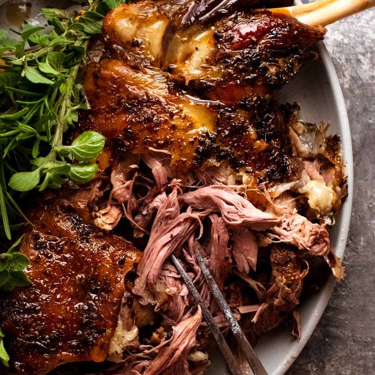 12-hour-greek-slow-roasted-lamb-shoulder_4 Showing how tender the flesh is of the 12 Hour Slow Roasted Lamb Shoulder