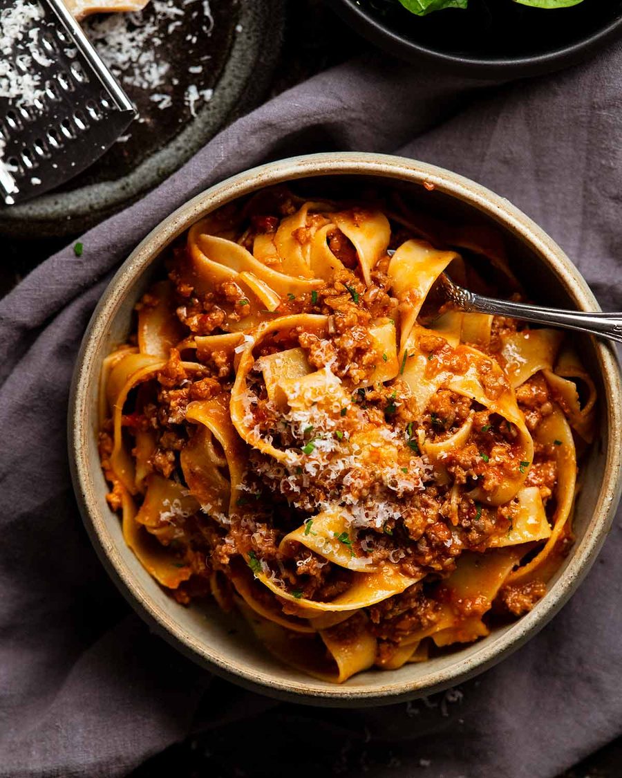 sausage-ragu_7 Sausage ragu pasta sauce with pappardelle in a bowl ready to be eaten